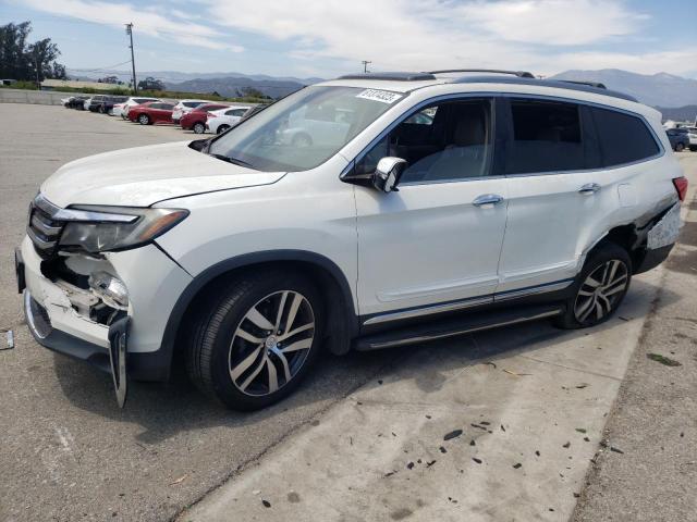 HONDA PILOT ELIT 2016 with VIN 5FNYF6H00GB059330 - Photo from auction