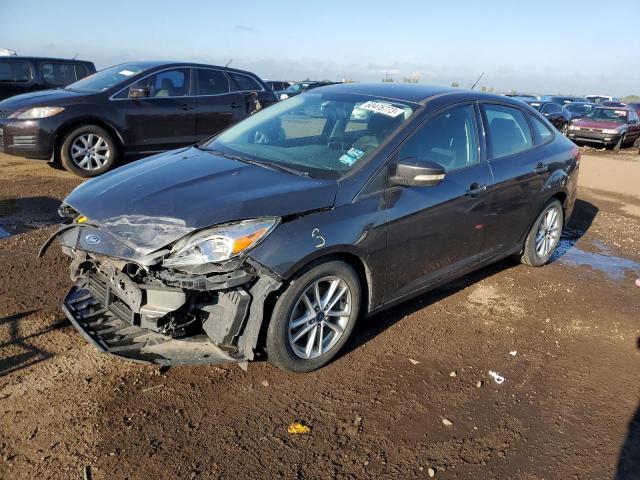 FORD FOCUS SE 2016 with VIN 1FADP3F2XGL253784 - Photo from auction