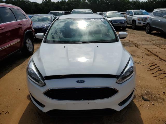 Foto 5 de la subasta – 2018 FORD FOCUS SE con VIN 1FADP3F28JL207295