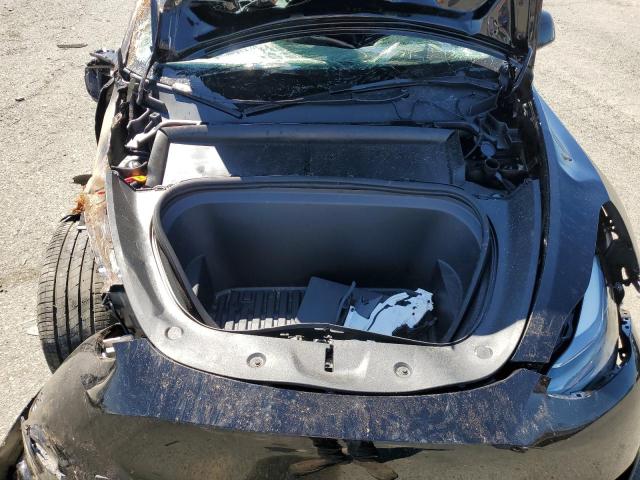 Photo 11 from auction – 2023 TESLA MODEL Y with VIN 7SAYGDEE2PF625895
