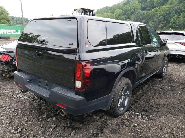 Photo 3 from auction – 2021 HONDA RIDGELINE with VIN 5FPYK3F54MB025564