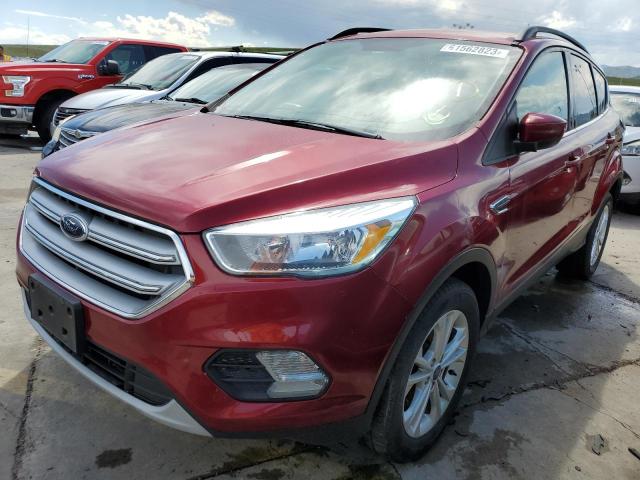 FORD ESCAPE SE 2018 with VIN 1FMCU9GD7JUC07991 - Photo from auction