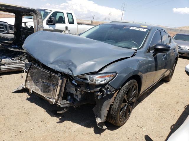 MAZDA 6 2021 with VIN JM1GL1WY4M1610976 - Photo from auction