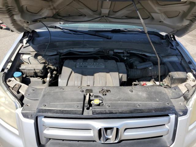 Photo 12 from auction – 2006 HONDA PILOT LX with VIN 2HKYF18166H501300