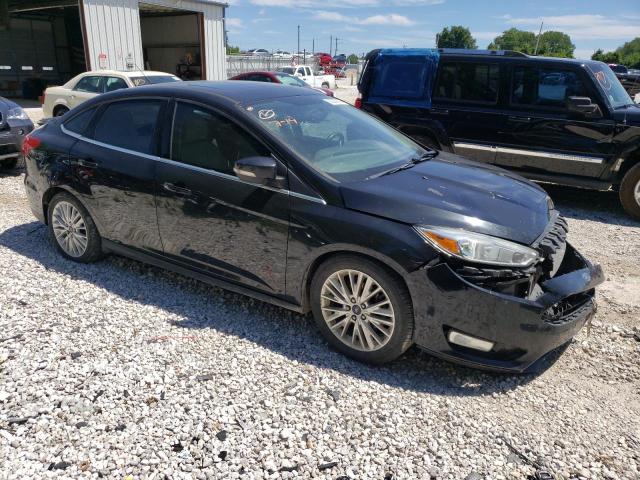 Photo 4 from auction – 2015 FORD FOCUS TITA with VIN 1FADP3J27FL354299