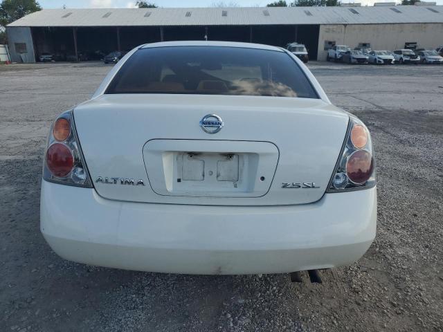 Photo 6 from auction – 2002 NISSAN ALTIMA BAS with VIN 1N4AL11D92C166849
