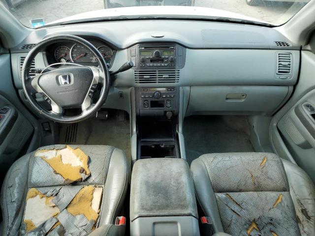 Photo 8 from auction – 2004 HONDA PILOT with VIN 2HKYF18524H524136