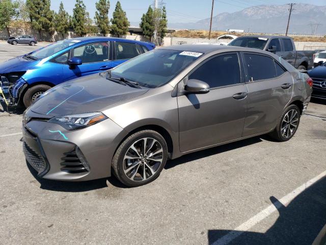 TOYOTA COROLLA L 2018 with VIN 5YFBURHE4JP762353 - Photo from auction