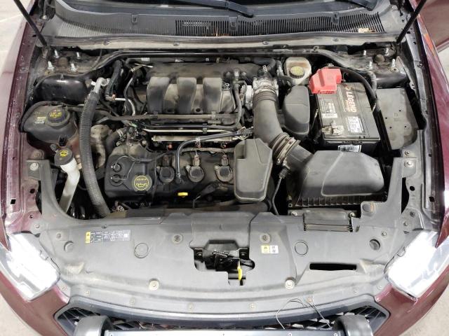 Photo 11 from auction – 2014 FORD TAURUS POL with VIN 1FAHP2MKXEG176838