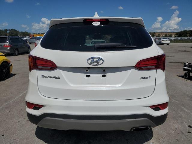 Photo 6 from auction – 2018 HYUNDAI SANTA FE S with VIN 5NMZU3LB6JH082036