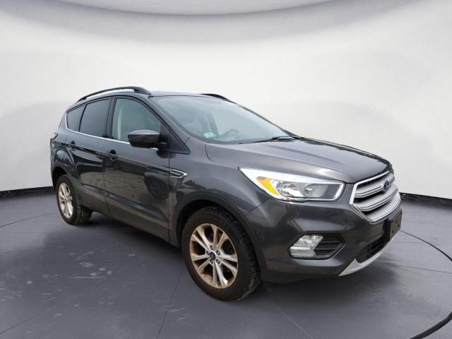Photo 4 from auction – 2018 FORD ESCAPE SE with VIN 1FMCU0GDXJUC90490