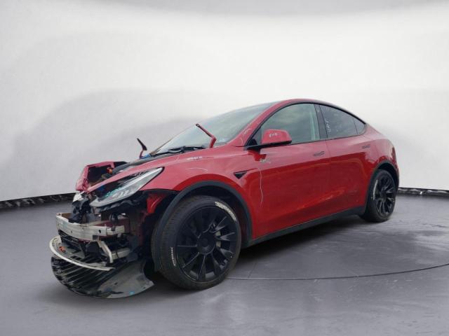 TESLA MODEL Y 2022 with VIN 7SAYGDEE4NF385990 - Photo from auction