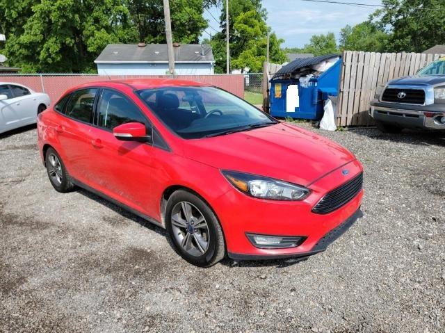 FORD FOCUS SE 2016 with VIN 1FADP3FE8GL318674 - Photo from auction