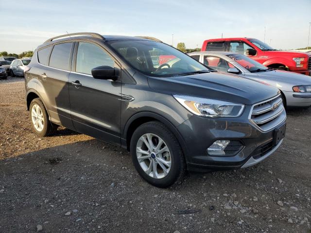 Photo 4 from auction – 2018 FORD ESCAPE SE with VIN 1FMCU9GDXJUC07001