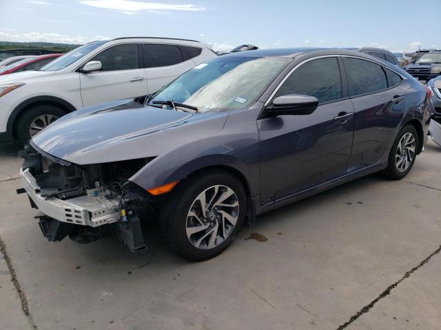 HONDA CIVIC EX 2018 with VIN 19XFC2F76JE020960 - Photo from auction