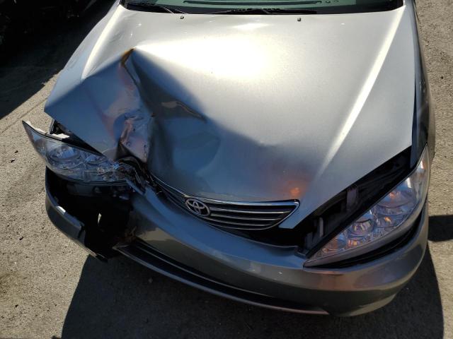 Photo 11 from auction – 2005 TOYOTA CAMRY LE with VIN 4T1BE30K85U973054
