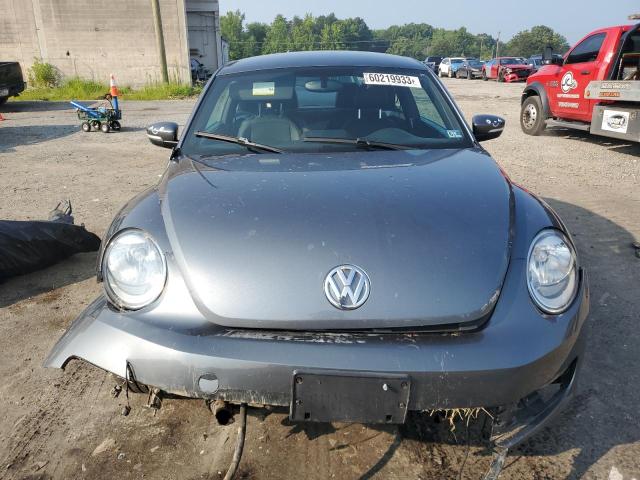 Photo 5 from auction – 2014 VOLKSWAGEN BEETLE with VIN 3VWJL7AT0EM607417