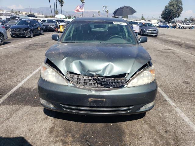 Photo 5 from auction – 2004 TOYOTA CAMRY LE with VIN 4T1BF30K84U074660