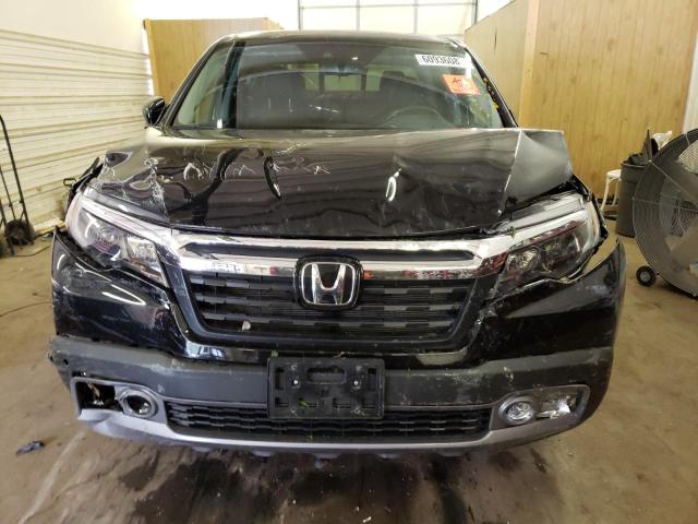 Photo 5 from auction – 2020 HONDA RIDGELINE with VIN 5FPYK3F75LB014119