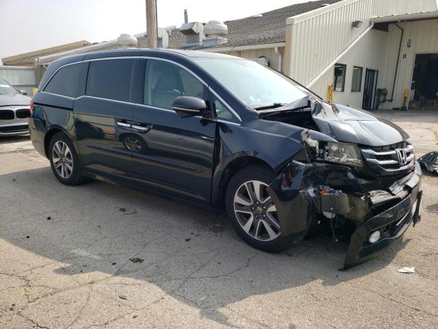 Photo 4 from auction – 2014 HONDA ODYSSEY TO with VIN 5FNRL5H98EB097262