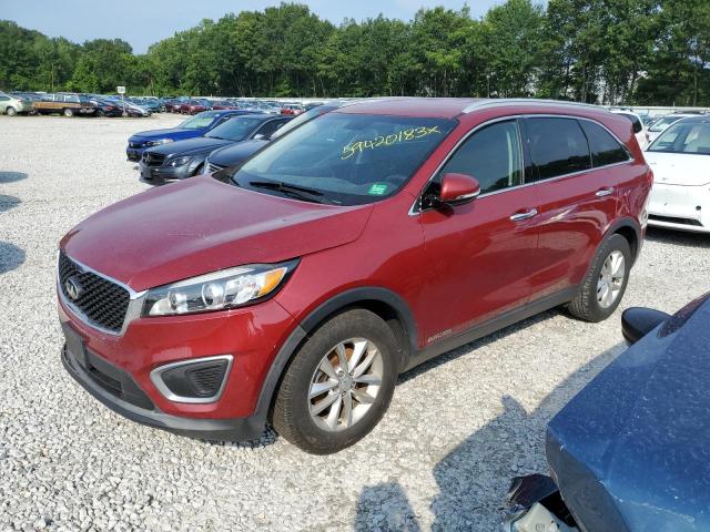 KIA SORENTO LX 2016 with VIN 5XYPGDA58GG090076 - Photo from auction