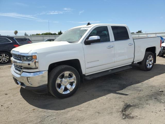 CHEVROLET SILVERADO 2018 with VIN 3GCPCSEC2JG501036 - Photo from auction