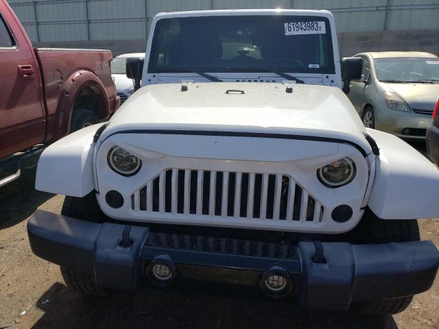 Photo 5 from auction – 2016 JEEP WRANGLER U with VIN 1C4BJWEG7GL109871