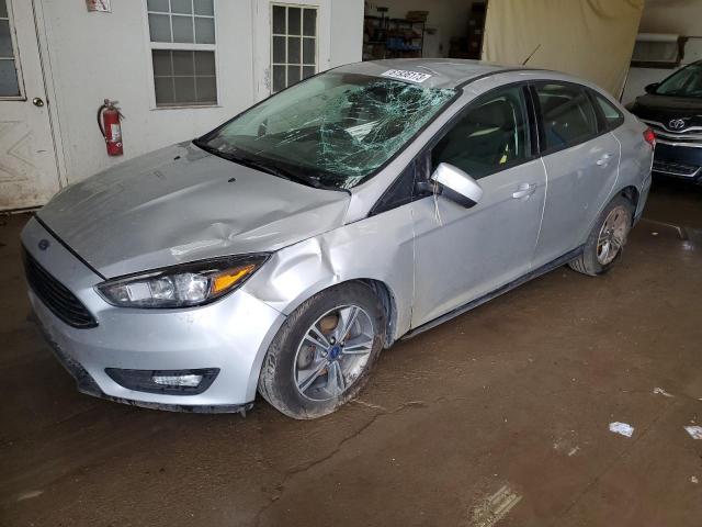 FORD FOCUS SE 2018 مع رقم تعريف المركبة 1FADP3FE5JL203697 - صورة من المزاد