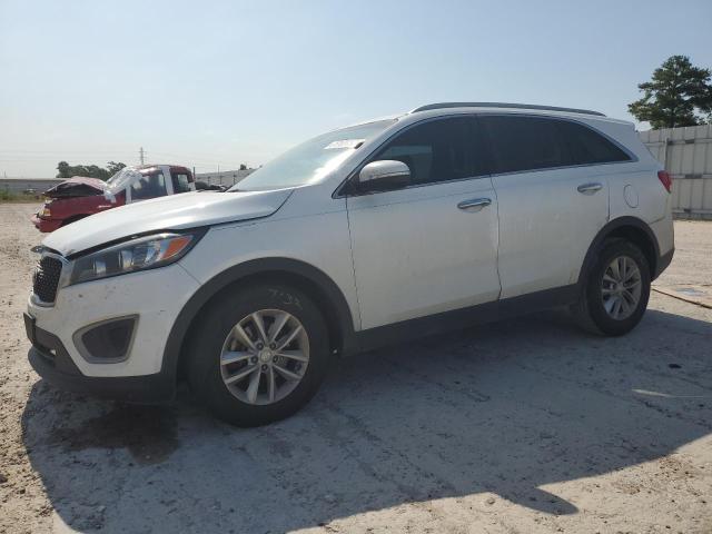 KIA SORENTO LX 2016 with VIN 5XYPG4A34GG034246 - Photo from auction