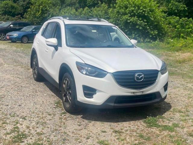 MAZDA CX-5 GT 2016 with VIN JM3KE4DY4G0875973 - Photo from auction