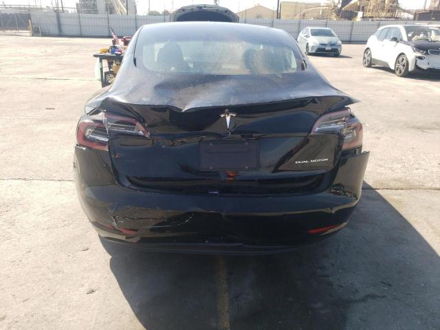 Photo 6 from auction – 2021 TESLA MODEL 3 with VIN 5YJ3E1EBXMF003672