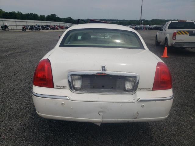 Photo 6 from auction – 2004 LINCOLN TOWN CAR E with VIN 1LNHM81W14Y660690