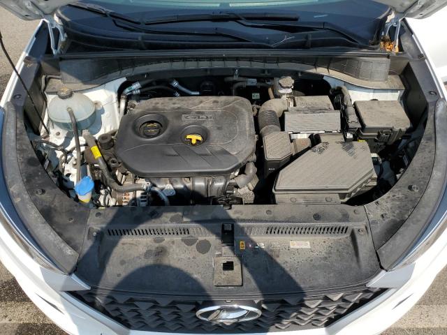 Photo 12 from auction – 2020 HYUNDAI TUCSON SE with VIN KM8J2CA45LU152270