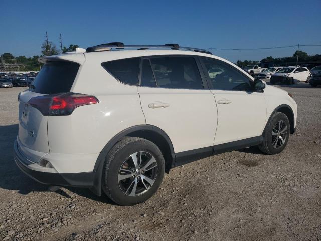 Photo 3 from auction – 2017 TOYOTA RAV4 XLE with VIN JTMRFREV3HJ714578
