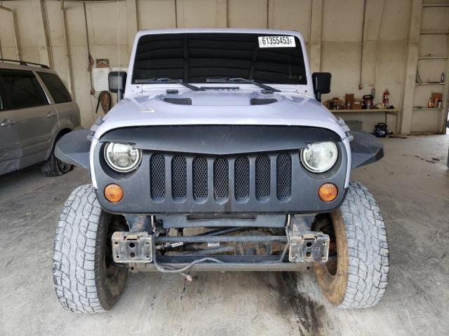 Photo 5 from auction – 2011 JEEP WRANGLER U with VIN 1J4BA5H14BL634603