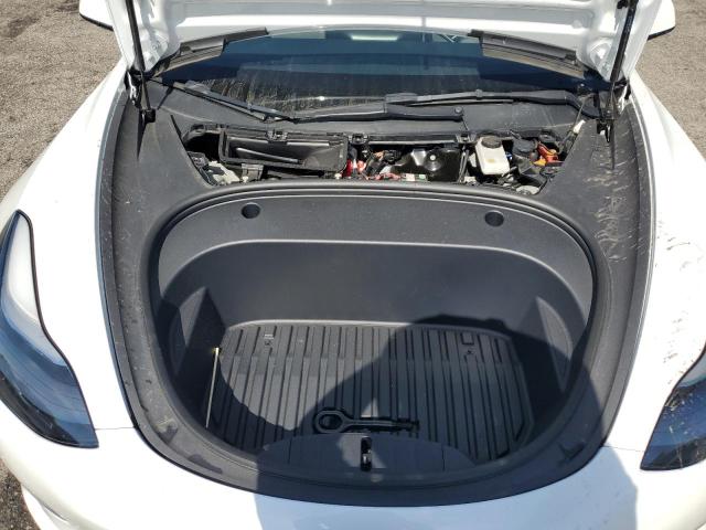 Photo 11 from auction – 2022 TESLA MODEL 3 with VIN 5YJ3E1EB5NF266430