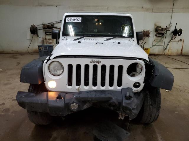 Photo 5 from auction – 2014 JEEP WRANGLER U with VIN 1C4BJWKG2EL293487