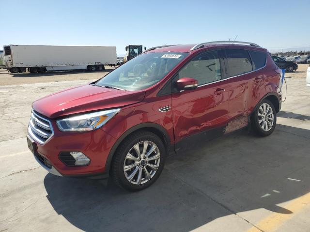FORD ESCAPE TIT 2017 with VIN 1FMCU0JD3HUC67877 - Photo from auction