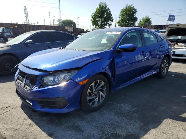 HONDA CIVIC EX 2018 with VIN 2HGFC2F76JH590785 - Photo from auction