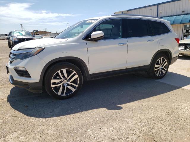 Photo 1 from auction – 2016 HONDA PILOT TOUR with VIN 5FNYF5H90GB010833