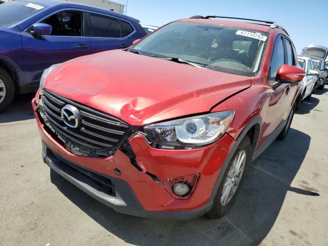 MAZDA CX-5 TOURI 2016 with VIN JM3KE2CY1G0851099 - Photo from auction