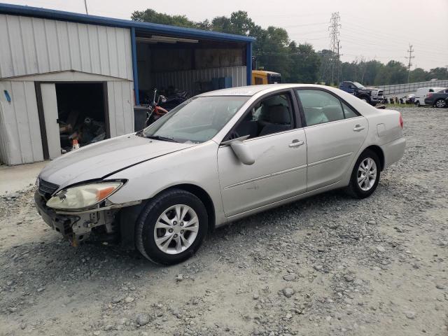 TOYOTA CAMRY LE 2004 with VIN 4T1BF32K64U569839 - Photo from auction