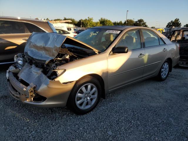 TOYOTA CAMRY LE 2002 with VIN JTDBF30K120083211 - Photo from auction