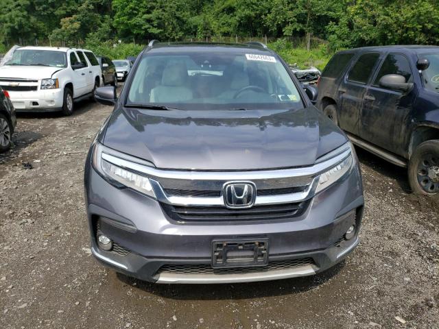 Photo 5 from auction – 2022 HONDA PILOT TOUR with VIN 5FNYF6H63NB007806