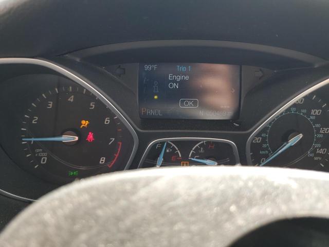 Photo 9 from auction – 2014 FORD FOCUS S with VIN 1FADP3E21EL216427