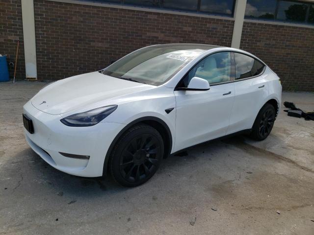 TESLA MODEL Y 2023 with VIN 7SAYGDEE1PF688504 - Photo from auction