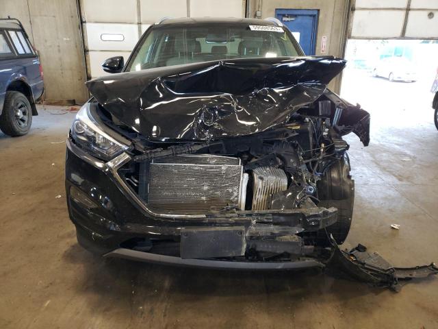 Photo 5 from auction – 2016 HYUNDAI TUCSON LIM with VIN KM8J33A21GU038008