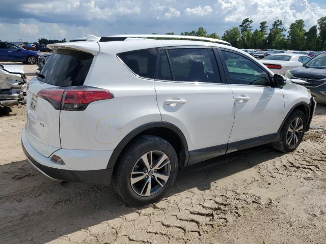 Photo 3 from auction – 2016 TOYOTA RAV4 XLE with VIN JTMWFREV8GJ072845
