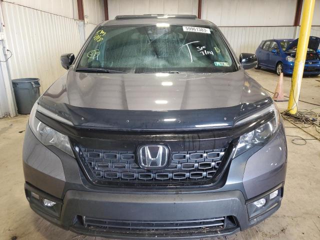 Photo 5 from auction – 2021 HONDA PASSPORT E with VIN 5FNYF8H55MB040257