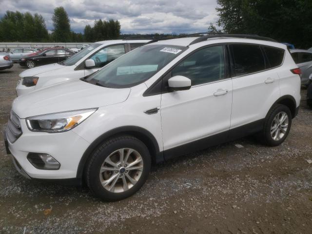 FORD ESCAPE SE 2018 with VIN 1FMCU9GD4JUC88240 - Photo from auction